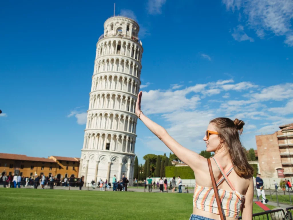 girl holding a Tower of Pisa