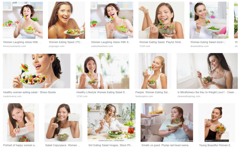 woman eating salad